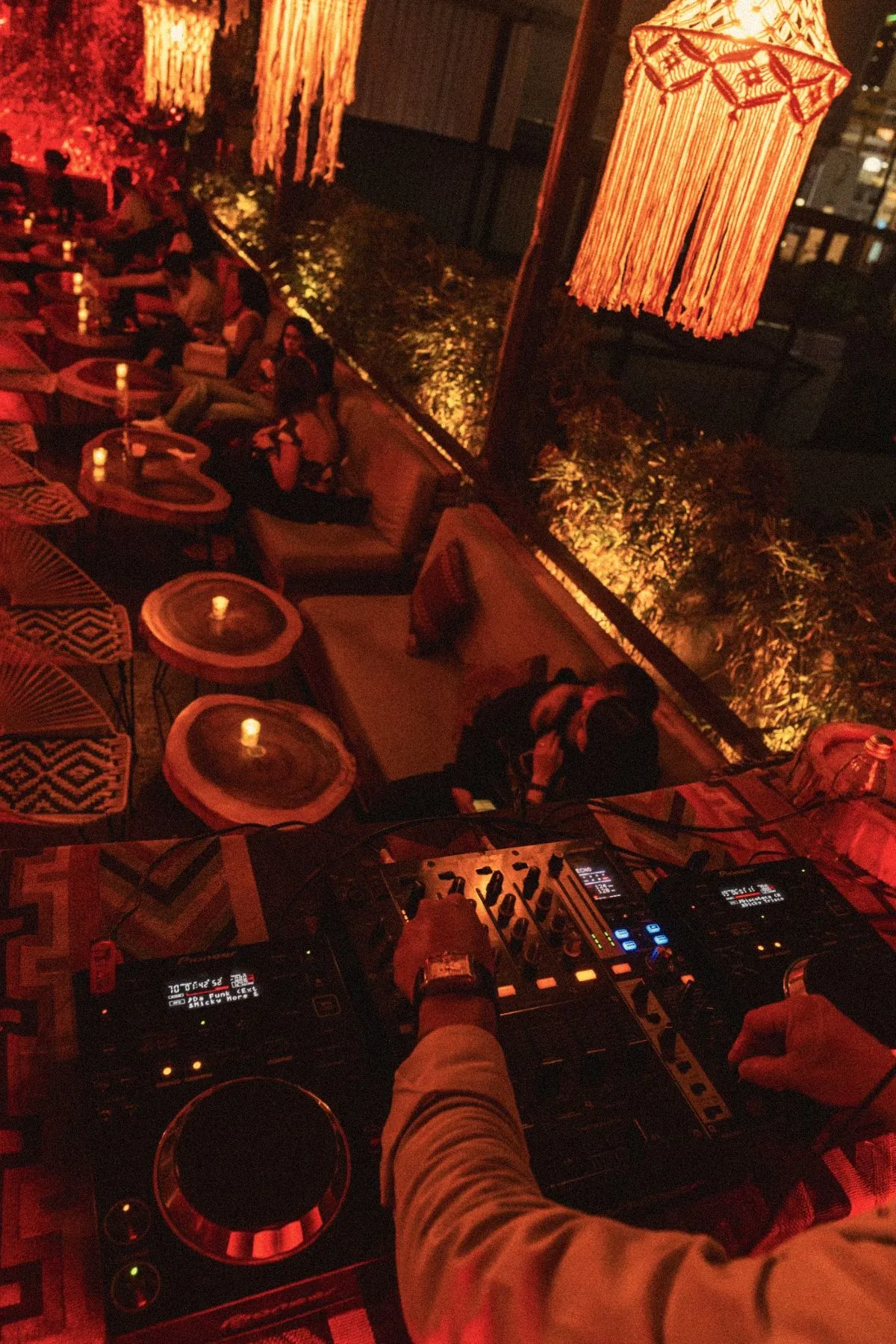 The Mantra Rooftop terrace at night, in warm low light