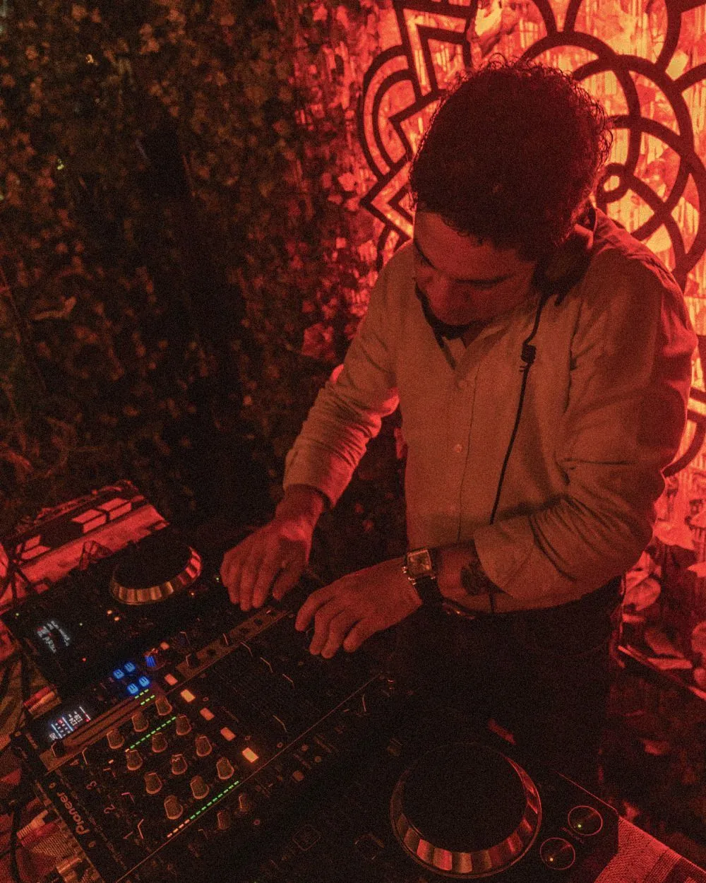 The terrace at night with a DJ